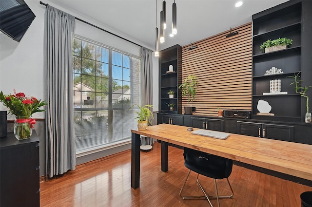 4524 Rosedale Dr, Grand Prairie, TX 75052 - office with wood finished floors, built in shelves, and recessed lighting