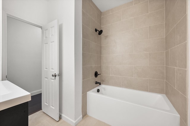 710 E 3rd Ave, Corsicana, TX 75110 - bathroom with bathtub / shower combination, tile patterned flooring, vanity, and baseboards