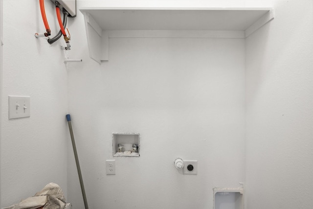710 E 3rd Ave, Corsicana, TX 75110 - laundry room featuring electric dryer hookup and hookup for a washing machine