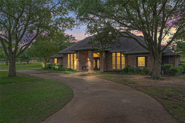 120 Willow Oak Ct, Double Oak, TX 75077 - view of front of home featuring brick siding, a front lawn, roof with shingles, and concrete driveway