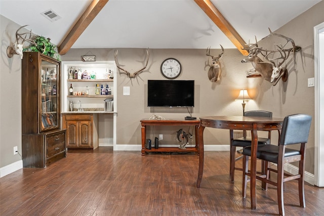 120 Willow Oak Ct, Double Oak, TX 75077 - living area featuring beam ceiling, dark wood-type flooring, and baseboards