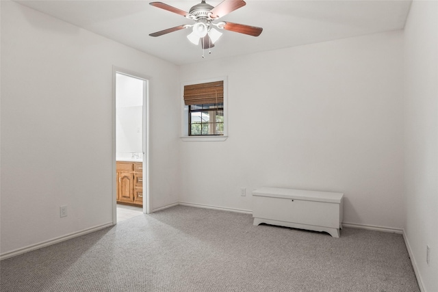 120 Willow Oak Ct, Double Oak, TX 75077 - spare room with light carpet, a ceiling fan, and baseboards