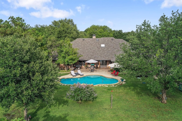 120 Willow Oak Ct, Double Oak, TX 75077 - swimming pool with a patio and a lawn