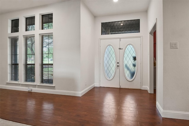 120 Willow Oak Ct, Double Oak, TX 75077 - entryway with dark wood-style flooring and baseboards