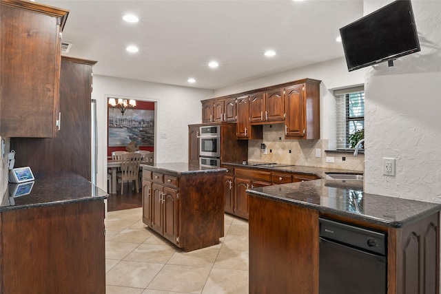 120 Willow Oak Ct, Double Oak, TX 75077 - kitchen featuring a sink, recessed lighting, light tile patterned floors, a center island, and a chandelier