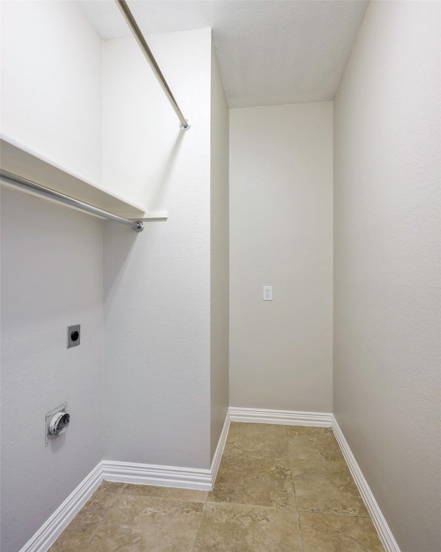 11212 Sunrise Ln, Frisco, TX 75035 - washroom featuring hookup for an electric dryer and baseboards