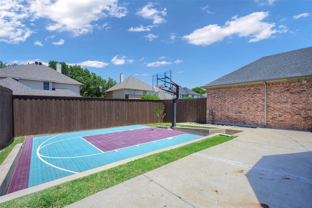 11212 Sunrise Ln, Frisco, TX 75035 - view of basketball court with basketball hoop and fence
