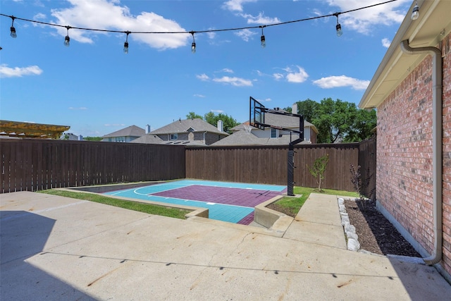 11212 Sunrise Ln, Frisco, TX 75035 - view of sport court with a fenced backyard and basketball court