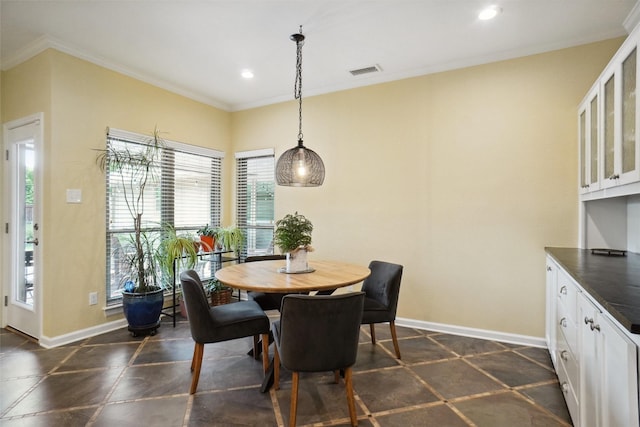 731 Falcon Ln, Coppell, TX 75019 - dining room with recessed lighting, baseboards, inlaid floor details, and ornamental molding