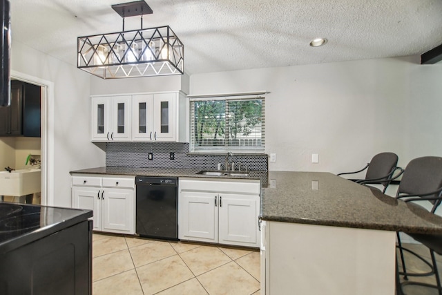 611 Buffalo Dr, Arlington, TX 76013 - kitchen with black appliances, a sink, a peninsula, light tile patterned flooring, and white cabinets