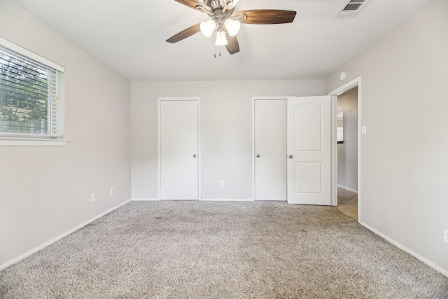 611 Buffalo Dr, Arlington, TX 76013 - unfurnished bedroom featuring carpet, baseboards, and a ceiling fan