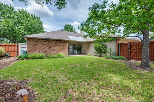 1404 Chicota Dr, Plano, TX 75023 - rear view of property featuring a gate, a patio, and brick siding