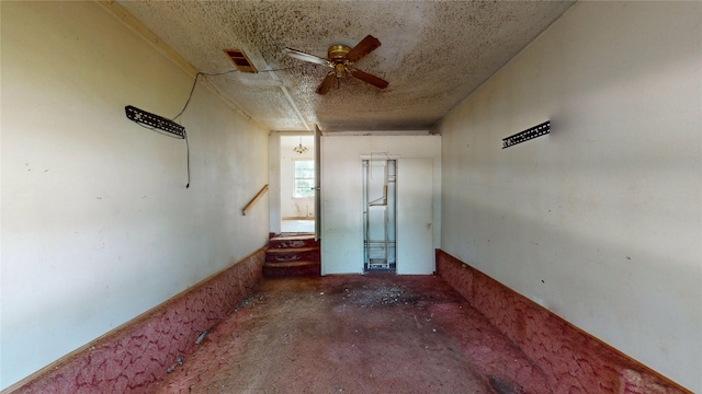 3243 Arizona Ave, Dallas, TX 75216 - spare room with a ceiling fan and a textured ceiling