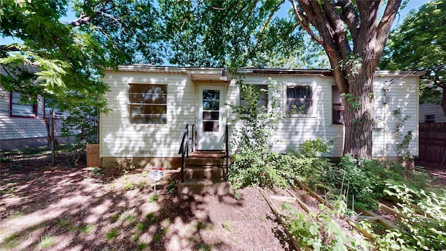 3243 Arizona Ave, Dallas, TX 75216 - view of front facade featuring entry steps and fence