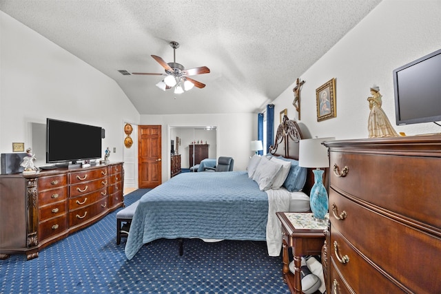 5637 Hunters Bend Ln, Dallas, TX 75249 - carpeted bedroom featuring lofted ceiling, a textured ceiling, and a ceiling fan