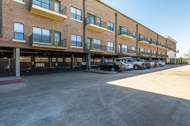330 Austin Unit 313, Waco, TX 76701 - view of property featuring uncovered parking