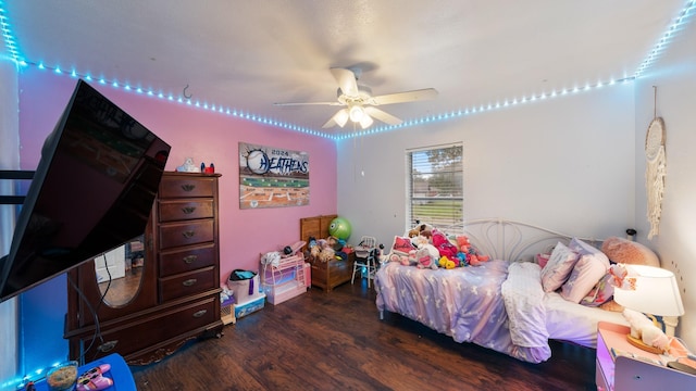 413 E 9th St, Kaufman, TX 75142 - bedroom featuring wood finished floors and a ceiling fan