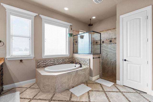 781 Audra Cir, Rhome, TX 76078 - full bath with a bath, walk in shower, vanity, baseboards, and recessed lighting