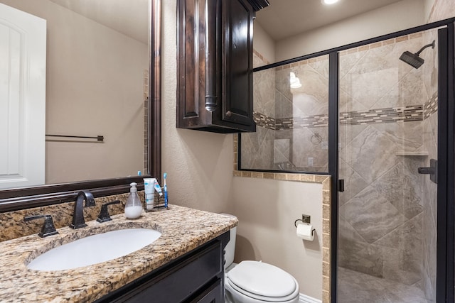 781 Audra Cir, Rhome, TX 76078 - bathroom featuring a stall shower, toilet, and vanity