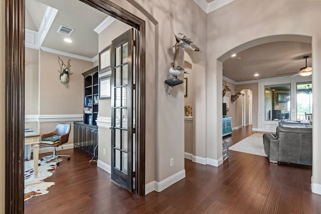781 Audra Cir, Rhome, TX 76078 - hall with arched walkways, crown molding, hardwood / wood-style flooring, recessed lighting, and baseboards