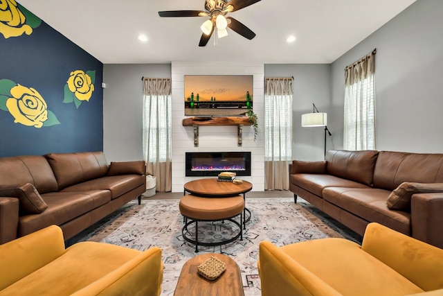 1116 Oakwood Ave, Waco, TX 76706 - living area featuring a ceiling fan, recessed lighting, a fireplace, and wood finished floors