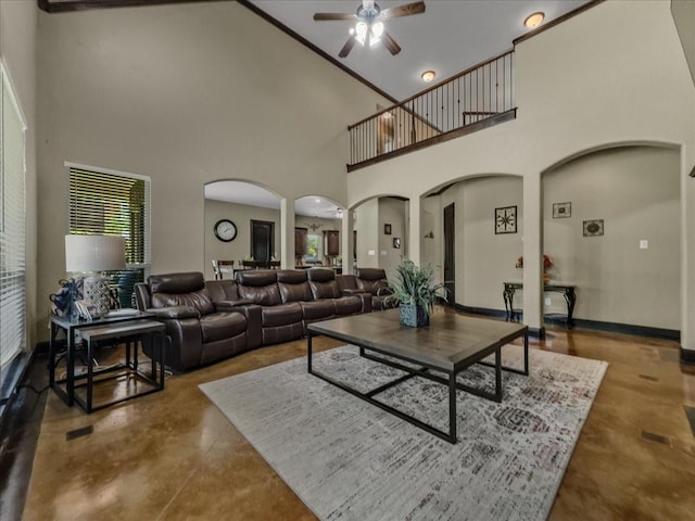 2723 Prairie Acres Cv, Cedar Hill, TX 75104 - living area featuring arched walkways, ceiling fan, concrete floors, and high vaulted ceiling
