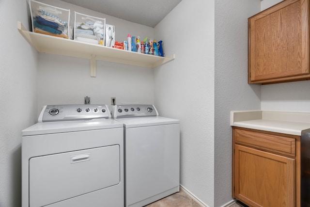 5502 Misty Crest Dr, Arlington, TX 76017 - laundry area with washer and dryer and cabinet space
