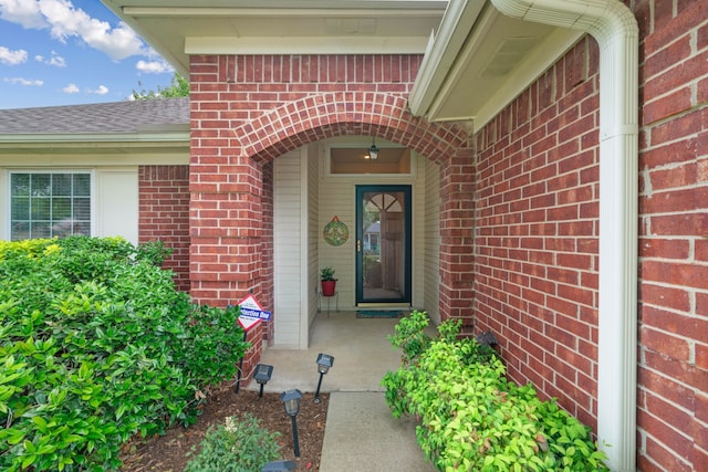 5502 Misty Crest Dr, Arlington, TX 76017 - property entrance featuring brick siding and roof with shingles