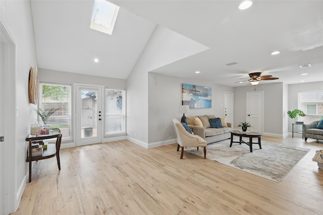 4636 Versailles Ln, Plano, TX 75093 - living room featuring plenty of natural light, baseboards, recessed lighting, light wood-style floors, and lofted ceiling