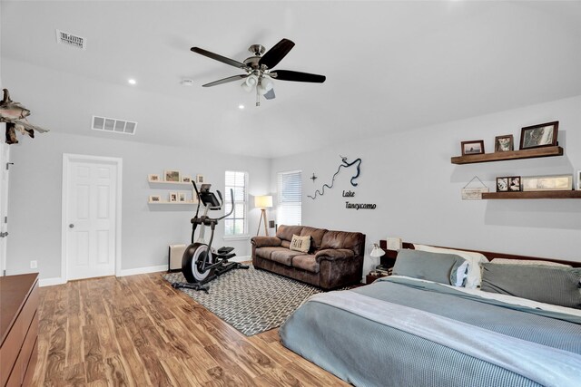 6105 Sidney Ln, Mckinney, TX 75070 - bedroom featuring wood finished floors, baseboards, and ceiling fan