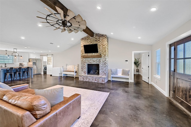 3094 Old Ida Rd, Whitewright, TX 75491 - living room featuring concrete flooring, ceiling fan, recessed lighting, baseboards, and a fireplace