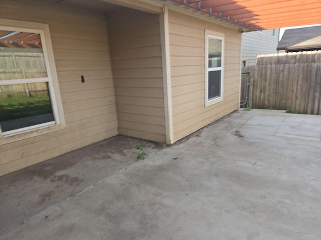 1322 Lucchese Ln, Dallas, TX 75253 - view of property exterior featuring a patio area and fence