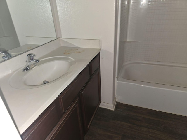 1322 Lucchese Ln, Dallas, TX 75253 - bathroom featuring wood finished floors and vanity