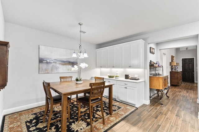 1319 Bridgewater Blvd, Celina, TX 75009 - dining area featuring light wood-type flooring, baseboards, and a chandelier