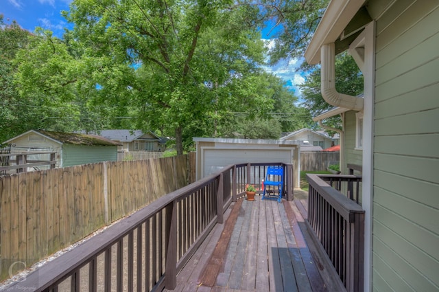 wooden deck featuring an outdoor structure
