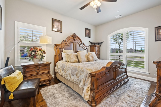 2604 Coyote Xing, Rockwall, TX 75087 - bedroom with baseboards, wood finished floors, and ceiling fan