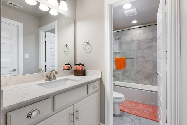 2604 Coyote Xing, Rockwall, TX 75087 - full bathroom featuring vanity, toilet, tile patterned flooring, and combined bath / shower with glass door
