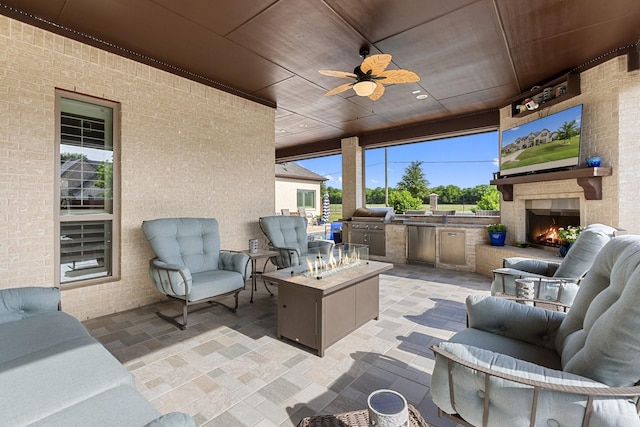 2604 Coyote Xing, Rockwall, TX 75087 - view of patio featuring an outdoor living space with a fireplace and a ceiling fan
