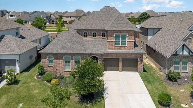 1607 Lilac Ln, Celina, TX 75009 - french country style house with brick siding and roof with shingles