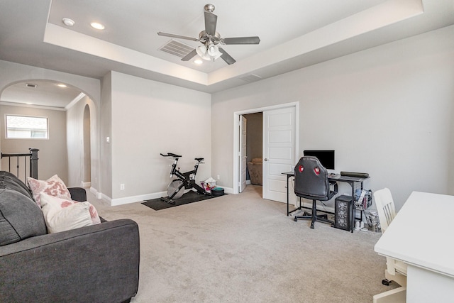 1607 Lilac Ln, Celina, TX 75009 - carpeted office with a tray ceiling, ceiling fan, arched walkways, baseboards, and recessed lighting