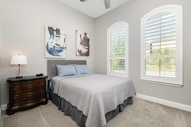 1607 Lilac Ln, Celina, TX 75009 - bedroom with light carpet, baseboards, and a ceiling fan