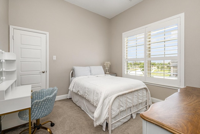 1607 Lilac Ln, Celina, TX 75009 - bedroom with baseboards, light colored carpet, and an office area