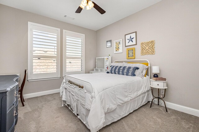 1607 Lilac Ln, Celina, TX 75009 - carpeted bedroom featuring baseboards and ceiling fan