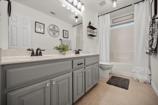 7608 White Fawn Rd, Arlington, TX 76002 - full bathroom with tile patterned flooring, toilet, double vanity, shower / tub combo, and baseboards