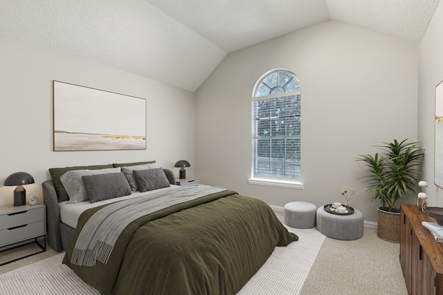 bedroom featuring lofted ceiling, carpet, a textured ceiling, and baseboards