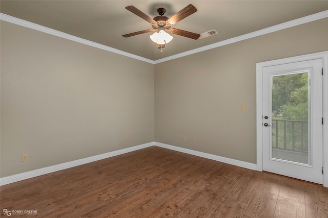 561 Linton Rd, Benton, LA 71006 - empty room with crown molding, dark wood-type flooring, baseboards, and a ceiling fan