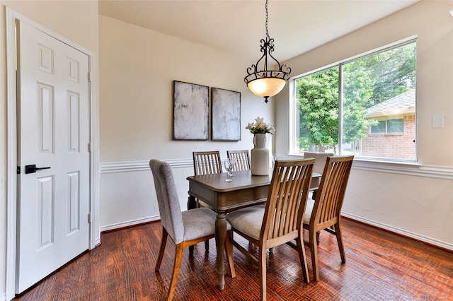 7627 Sweetgum Dr, Irving, TX 75063 - dining area with wood finished floors and baseboards