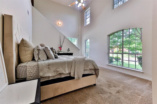 7627 Sweetgum Dr, Irving, TX 75063 - bedroom featuring a high ceiling, carpet floors, and baseboards