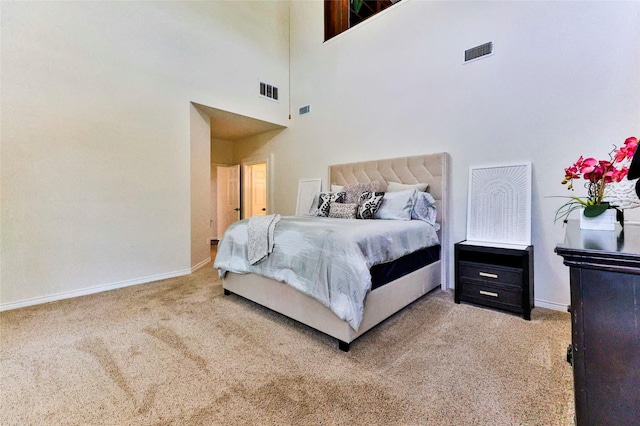 7627 Sweetgum Dr, Irving, TX 75063 - bedroom featuring carpet flooring, baseboards, and a high ceiling