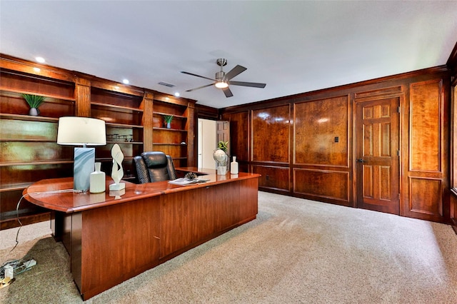 7627 Sweetgum Dr, Irving, TX 75063 - office featuring light colored carpet, ceiling fan, and wooden walls